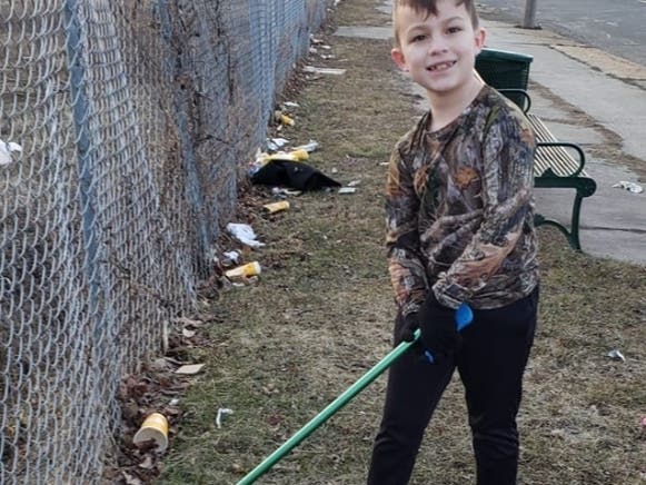 Jake Baron, 8, decided to do something about the accumulated garbage near his house. 