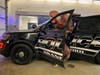 Godzilla trying to make off with a cop car. JK.