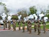 The guard fires a volley with their muskets.
