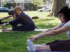 Liz Culligan, (front) Christine Ucich (middle) and Eric Ciolino practicing yoga. 