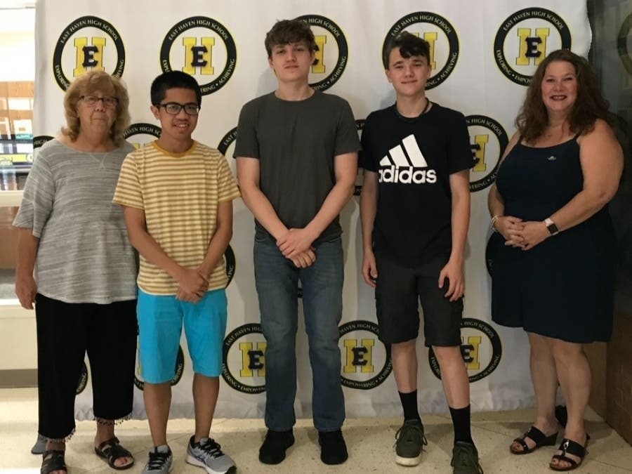 Rotarian Kathy Connor and students Ryan Sieng, for Music, Michael Kosiorek for Art, Ryan Edwards for Foreign Language and Rotarian Tammy Afragola. Missing from photo was Peter Le who was nominated from the Business Department.
