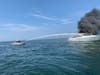 Branford Fire Department fire boats are seen battling a fire aboard a large yacht on LI Sound right off the Branford coastline.
