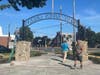 East Haven public works staff install the new arch at the Town Green