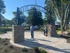East Haven Mayor Joe Carfora surveys the new arch installed at the Town Green by public works staff. 