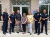 (From left) Branford police Capt. Greg Watrous, Capt. Dave Galdenzi, Branford Counseling Center Director Peter Cimino, police social worker Danielle Suraci, town HR director Margaret Luberda, Deputy Chief John Alves, and Lt. Phil Ramey. 
