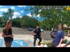 In a still image from the body camera of Branford police Officer William Burghart, Officer Jason Richardson is seen with new police social worker Danielle Suraci, who's conducting a mental health assessment at a local motel on Sept. 7.