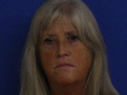 Donna Marino, 63, was charged with first-degree larceny and third-degree forgery. 