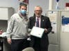 Guilford Fire Department captain Clint Haverkampf was honored by First Selectman Matt Hoey. 