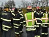 Branford firefighters salute during the playing of Taps.