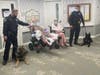 At Whispering Pines Nursing & Rehabilitation Center in East Haven, residents raised money to buy bulletproof vests for East Haven police K9s. 