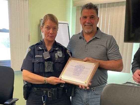 At the North Branford Board of Police Commissioners meeting Monday, Officer Kristen Fitzgerald was honored with an award for her life-saving response on April 22. 