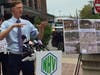 New Haven Mayor Justin Elicker explains the construction of a 10 foot in diameter drainage pipe in outfall structure, part of the cities inland and coastal flood resiliency project which will now be in part funded by a FEMA grant.