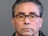 New Haven police officer Oscar Diaz, 54, booking photo.