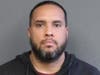 New Haven police officer Luis Rivera, 40, booking photo.