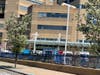A row of ambulances queue outside Yale New Haven Hospital's York Street Campus' emergency department. 