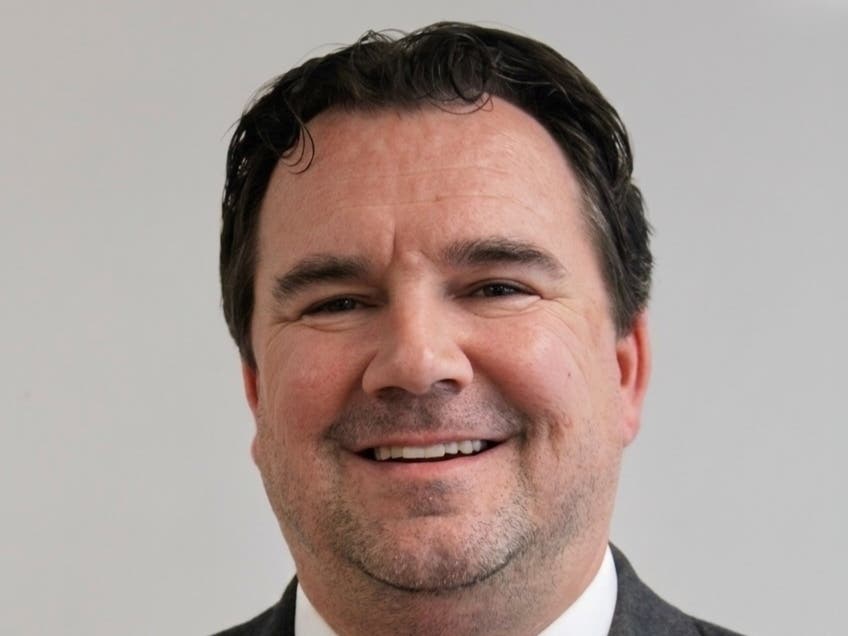 At Wilbur Cross 12 years, Brian Grindrod's teaching philosophy is built on foundations of project-based learning, where students move beyond traditional textbooks to engage directly with the mechanics of democracy through authentic, real-world challenges.