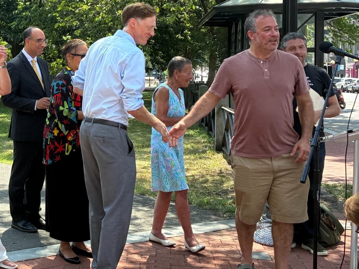 Mayor Justin Elicker and Colin Caplan at the July 2025 media event announcing the September pizza party in New Haven to beat the then-existing GUINNESS WORLD RECORDS™ 'World's Largest Pizza Party'