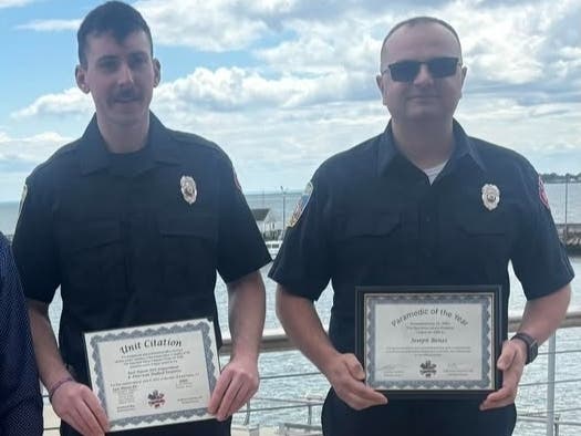 East Haven firefighter/paramedic Joseph Benzi was named Paramedic of the Year and East Haven firefighter/paramedic Chris Hughes received a Unit Citation for a cardiac arrest save.