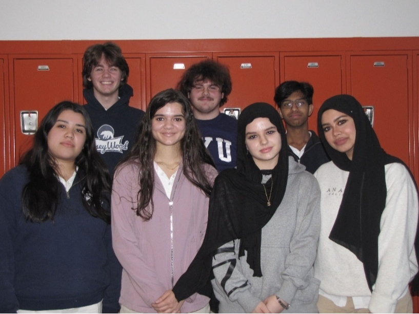 Back row (left to right): Patrick Nardini, Tyler Morse, Ethan Joseph  Front row (left to right): Osmara Quiñonez, Kallianny Gomes, Sedra Mohammed Ali, and Raisa Ahsan.