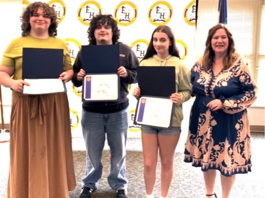 Students of the Month Terra Allen, Frank Prete, and Ava Rosarbo with Rotarian Tammy Afragola.