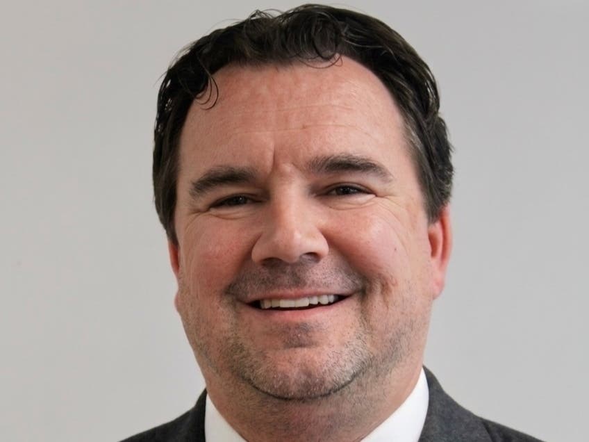 Brian Grindrod, a 20-year social studies teacher at Wilbur L. Cross High School will also join 52 other honorees as a finalist for the 2026 National History Teacher of the Year Award.