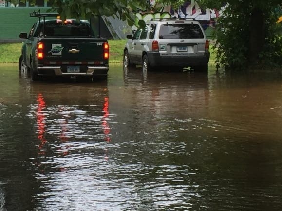 Floodwater can contain: Downed power lines, bacteria, viruses, and other germs;
sharp objects like broken glass and other debris; human and animal sewage, 
physical objects and obstacles like lumber, vehicles, open drains, and electrical dangers.