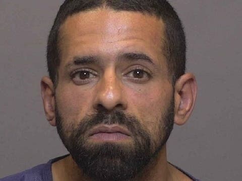 Police said surveillance footage showed the man going into and leaving the victim's apartment, then leaving the building and throwing what would later be identified as a knife into a back alley dumpster.