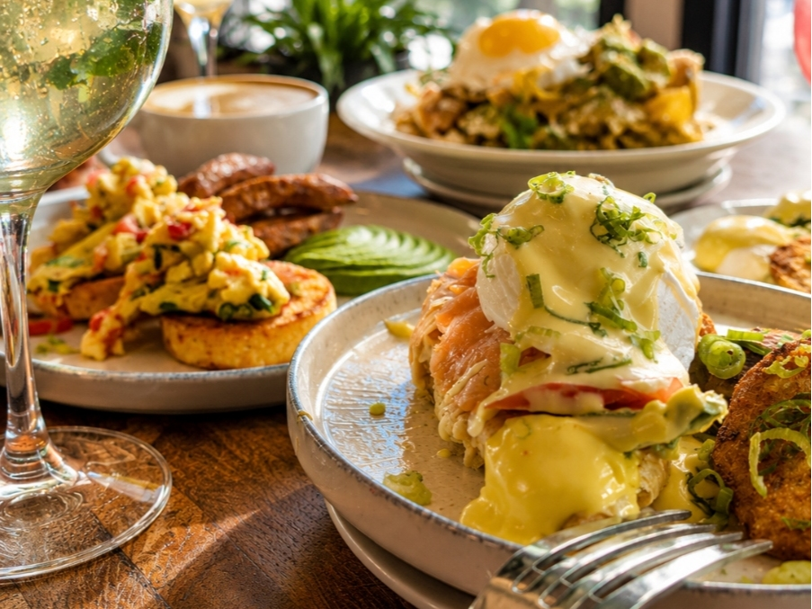 Among 80 Proof's 'The Place To Be Brunch' menu is a Smoked Salmon & Avocado Croissant Benedict.