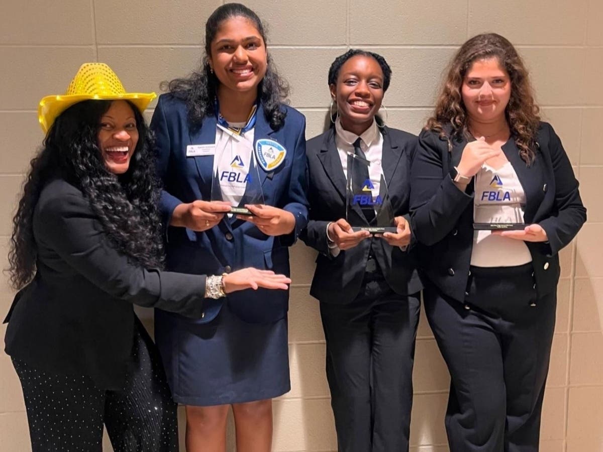ESUMS FBLA chapter advisor Lakesha Kirkland, and student winners Sahithi Aliminate, Zeina Al Haddad, and Asia Murphy.