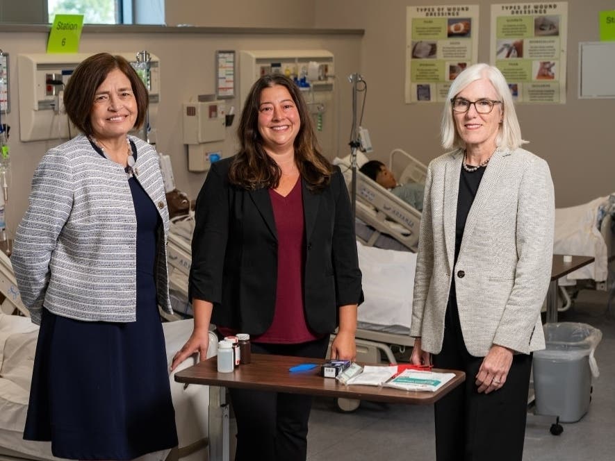Maria Krol, interim executive director of healthcare programs and professor of nursing; Andrea Adimando, chair and associate professor of nursing; and Michele Vancour, interim dean of the College of Health and Human Services.