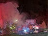 When firefighters arrived at Andys Drive, they encountered a "heavily involved car fire with exposure to a nearby house."