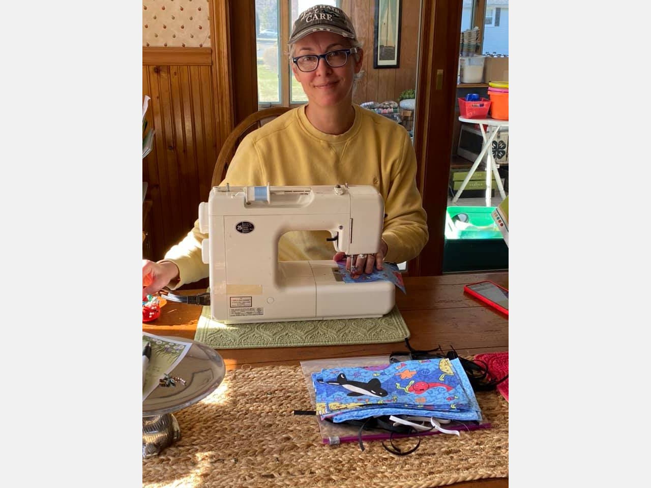 Blue Hills Regional Guidance Counselor Sarah Titus sewing face masks.