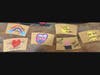 Examples of hand embellished cup sleeves created by Junior League of Summit members to create positivity and spread kindness and optimism in our local community.