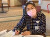 Melanie Zhang works at Cedar Crest's Concierge Desk.