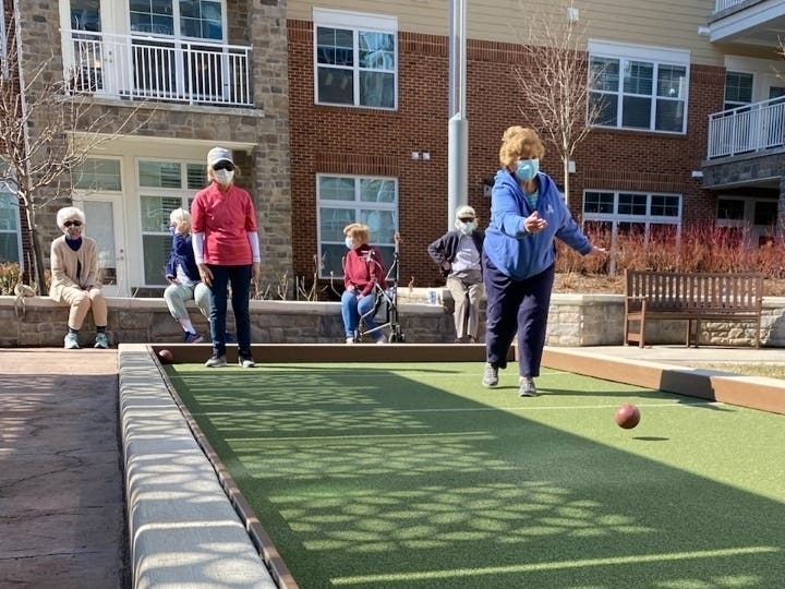 Residents enjoy a game of Bocce at Lantern Hill. 