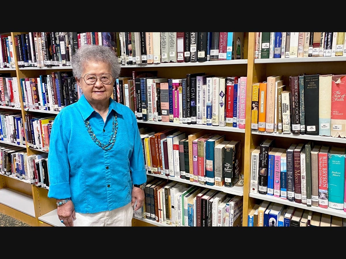 Thanks to the maintenance-free lifestyle she gained when she moved to Cedar Crest, resident Judy Miao has more time to take advantage of the abundant amenities around campus, like the library.