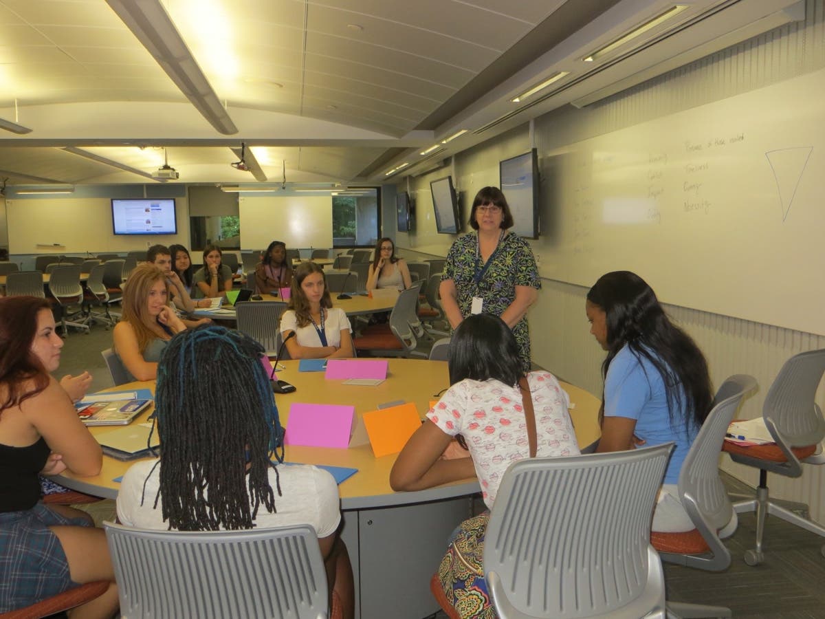 Instructor Kate Farrish teaches journalism at a previous workshop