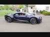 Attendees take in this Bugatti Chiron.