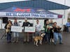 Tom Lawrence presents Running for the Paws proceeds to Last Chance Ranch and Dog Town Rescue.
