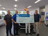 L-R: Jeramie Treadway, General Sales Manager, A&T Subaru; 
Phil LaFiura, General Manager, A&T Subaru; 
Malcolm Friend, Director of Resource Development, Keystone Opportunity Center; 
Joe Fost, General Manager, A&T Subaru