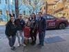 A&T Subaru employees delivering over 305 lbs of food and supplies to Keystone Opportunity Center manager of advancement, Alan Raisman