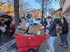 A&T Subaru employees delivering over 305 lbs of food and supplies to Keystone Opportunity Center manager of advancement, Alan Raisman