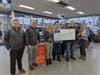 Presentation of $2,515.00 in proceeds to Dog Town Rescue
Representatives of A&T Chevrolet-Subaru pose with Dog Town Rescue founder Jennifer Joseph (center), volunteers, and adoptable dogs.