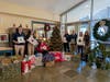 Representatives of A&T Subaru deliver gifts and donations to EMC Elementary School and Keystone Opportunity Center