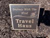 Pictured: Plaque for Journey with the Wind sculpture in Rotary Park, Souderton, donated by Suzi Berry in honor of Travel Haus’ 40th anniversary.