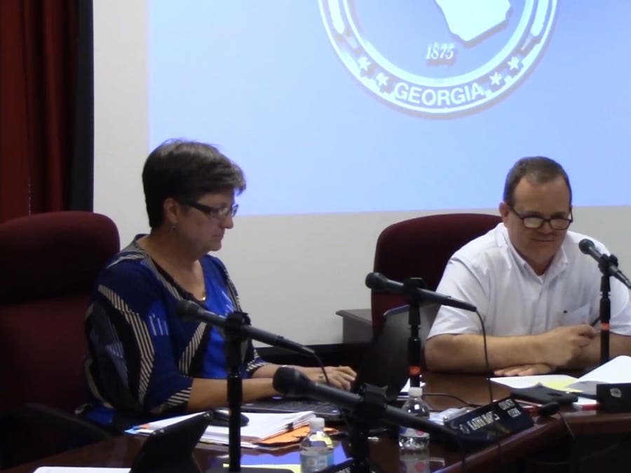 County Clerk Kathy Hayes and Chair John Daniell