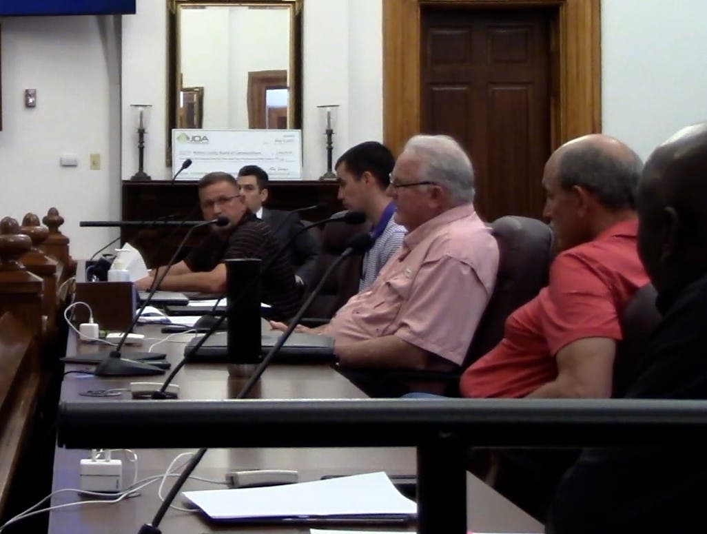 Thompson (Center), With Saxon (Left)