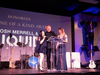 Amy Diaz, Tilly’s Life Center’s Vice President of Development and Monica Utley, Executive Director honor Josh Merrell and his company, Liquid Graphics, with the “I Am One of a Kind Award” for his ongoing support