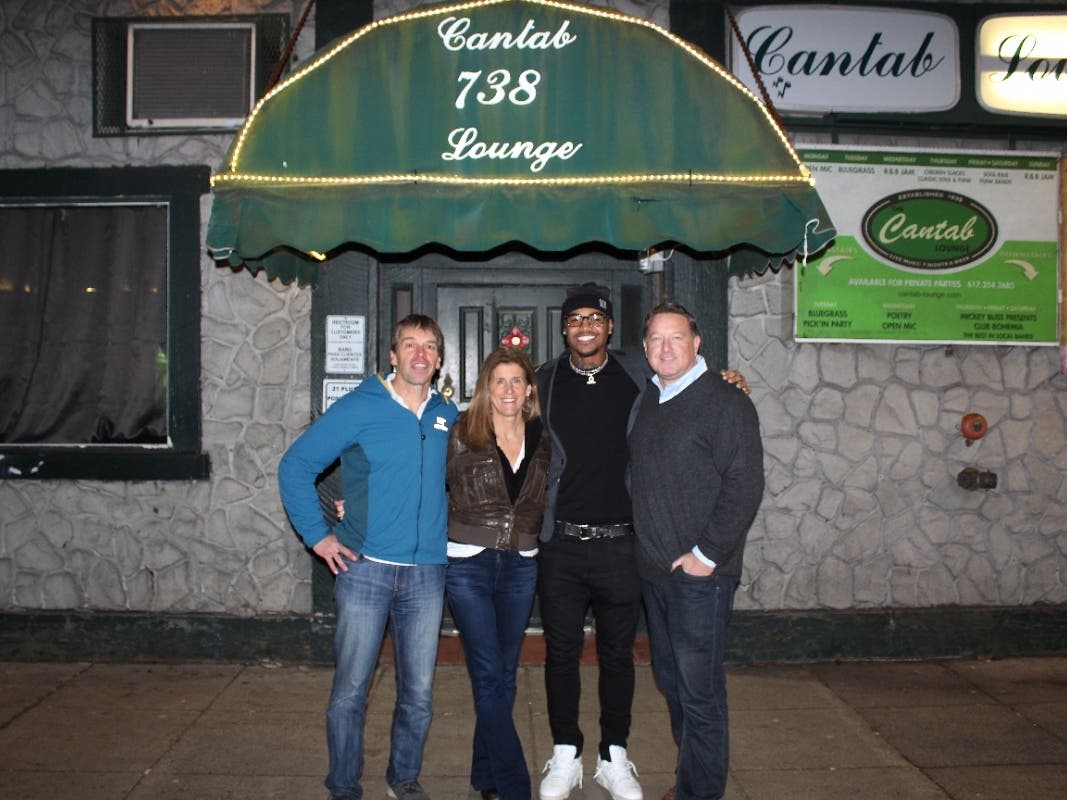 From L to R: The Cantab Lounge owners Tim and Maureen DIbble, New England Patriots Wide Receiver Kendrick Bourne, and Big Brothers Big Sisters of Eastern Massachusetts President and CEO Mark O'Donnell.
