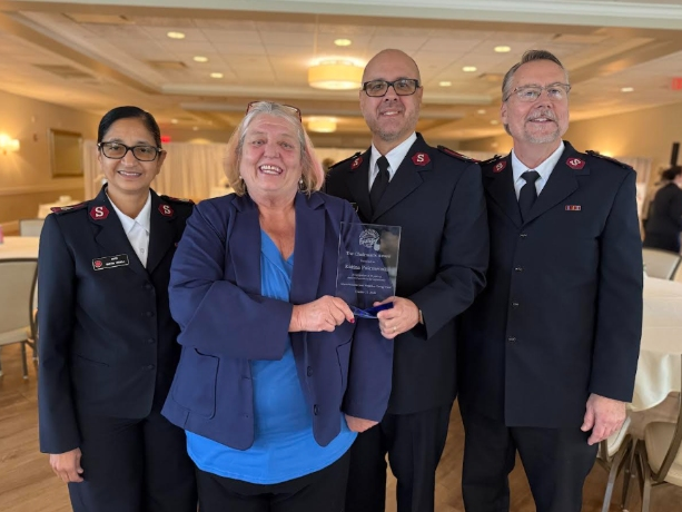 Katina Polemenako (second from left) receives the GNEF Chairman’s Award in recognition of 40-years of service from the Good Neighbor Energy Fund (GNEF) during the Fund’s 41st Annual Kickoff Breakfast in Quincy, MA on October 21, 2026.